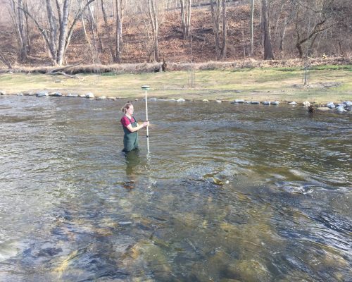 In this photo, Princeton Hydro team member gathers data on the Hughesville Dam removal, using GPS to check the elevation of the constructed riffle on the beautiful Musconetcong River.